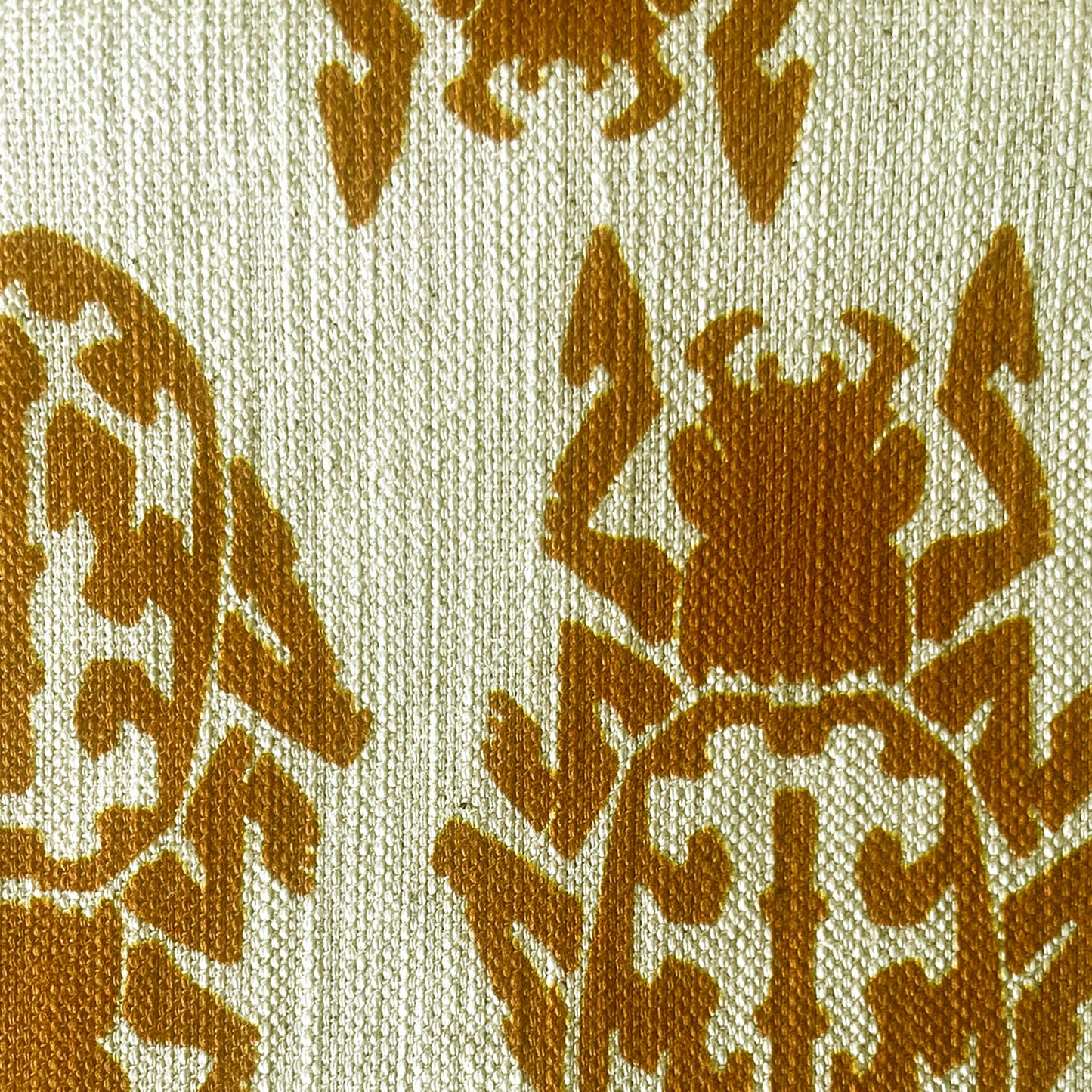 Insect Rust on Beige Tablecloth